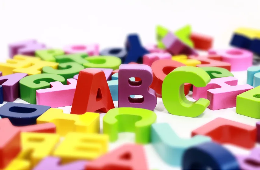 Brightly colored alphabet shaped blocks