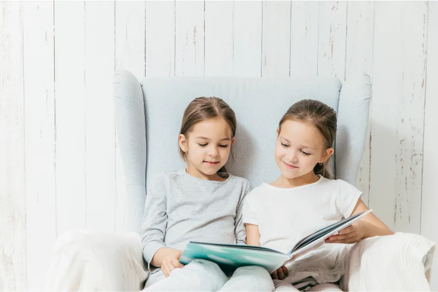 sisters sharing a story
